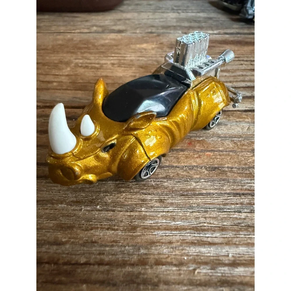 VTG 90s Matchbox Rhino Rod Diecast Car Gold Animal Toy Chrome Engine 1994
